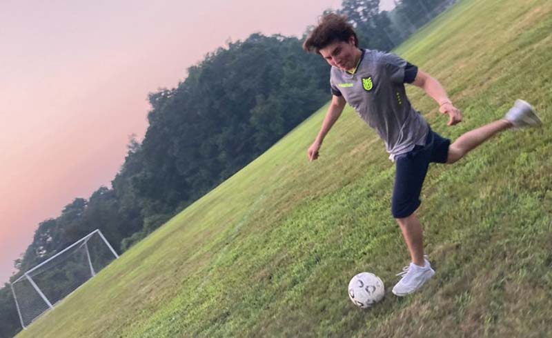 STM Summer Camp Student Playing Soccer
