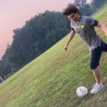 Male Student Playing Soccer